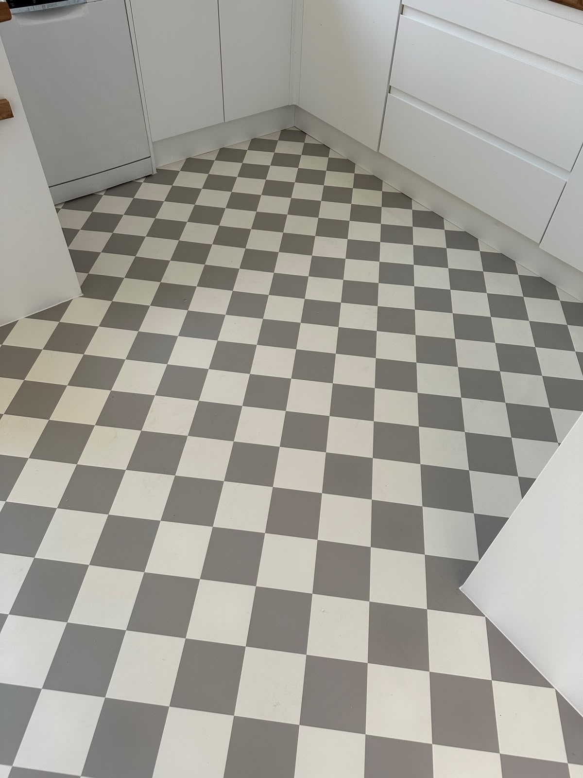 Grey and white checkerboard vinyl floor