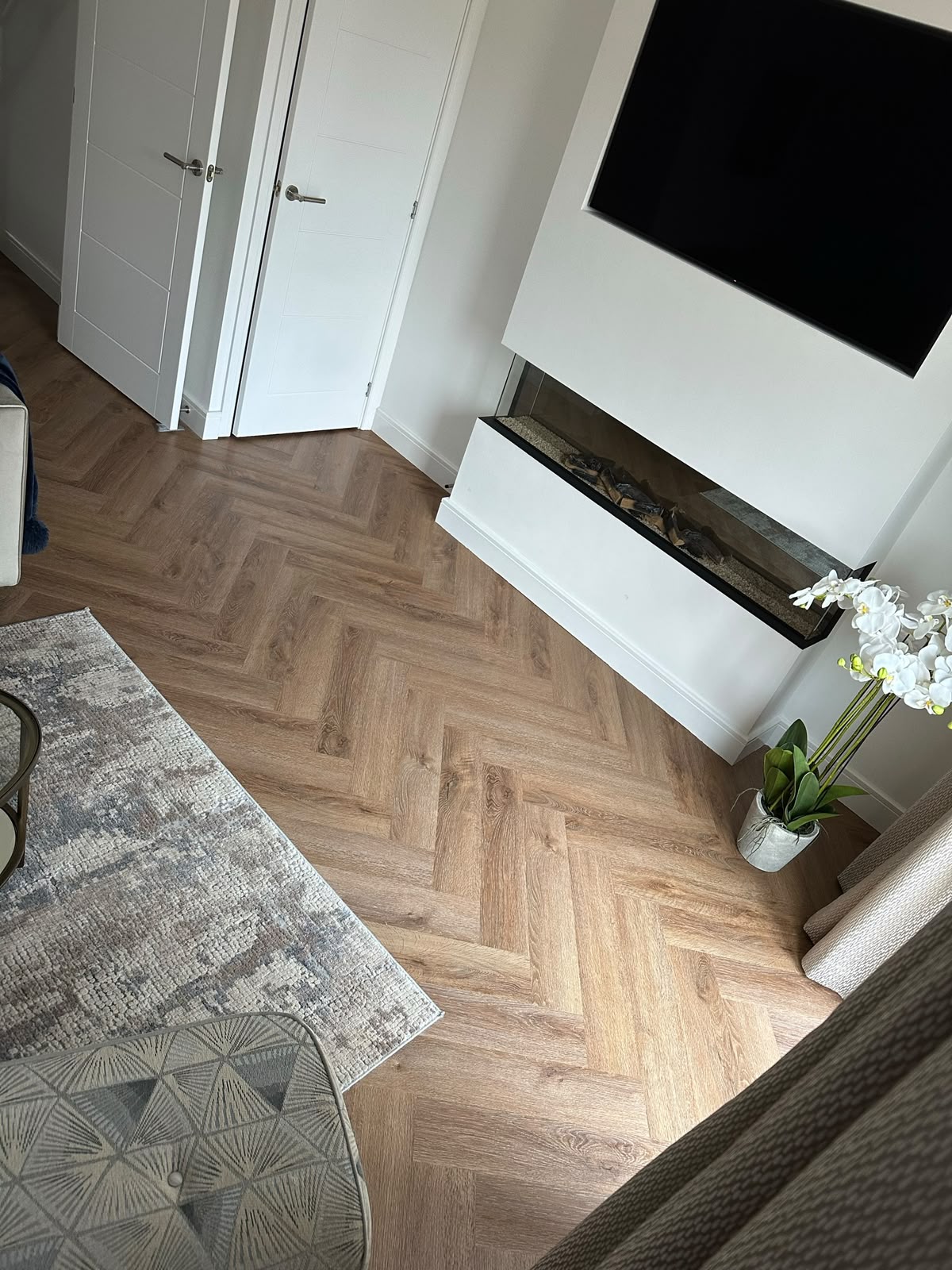 Herringbone LVT flooring fitted in a modern living room, Tamworth