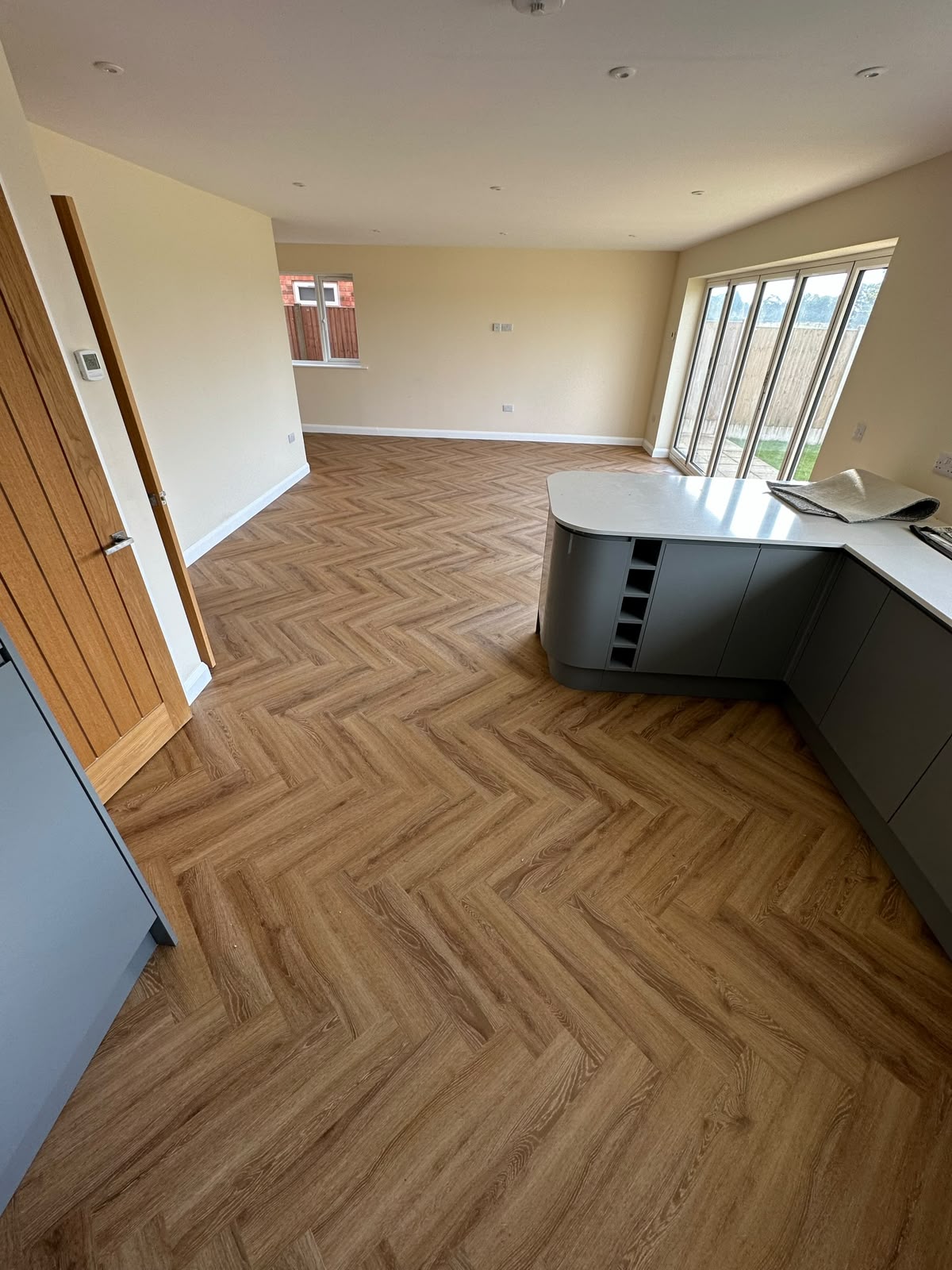Herringbone LVT fitted in a kitchen diner